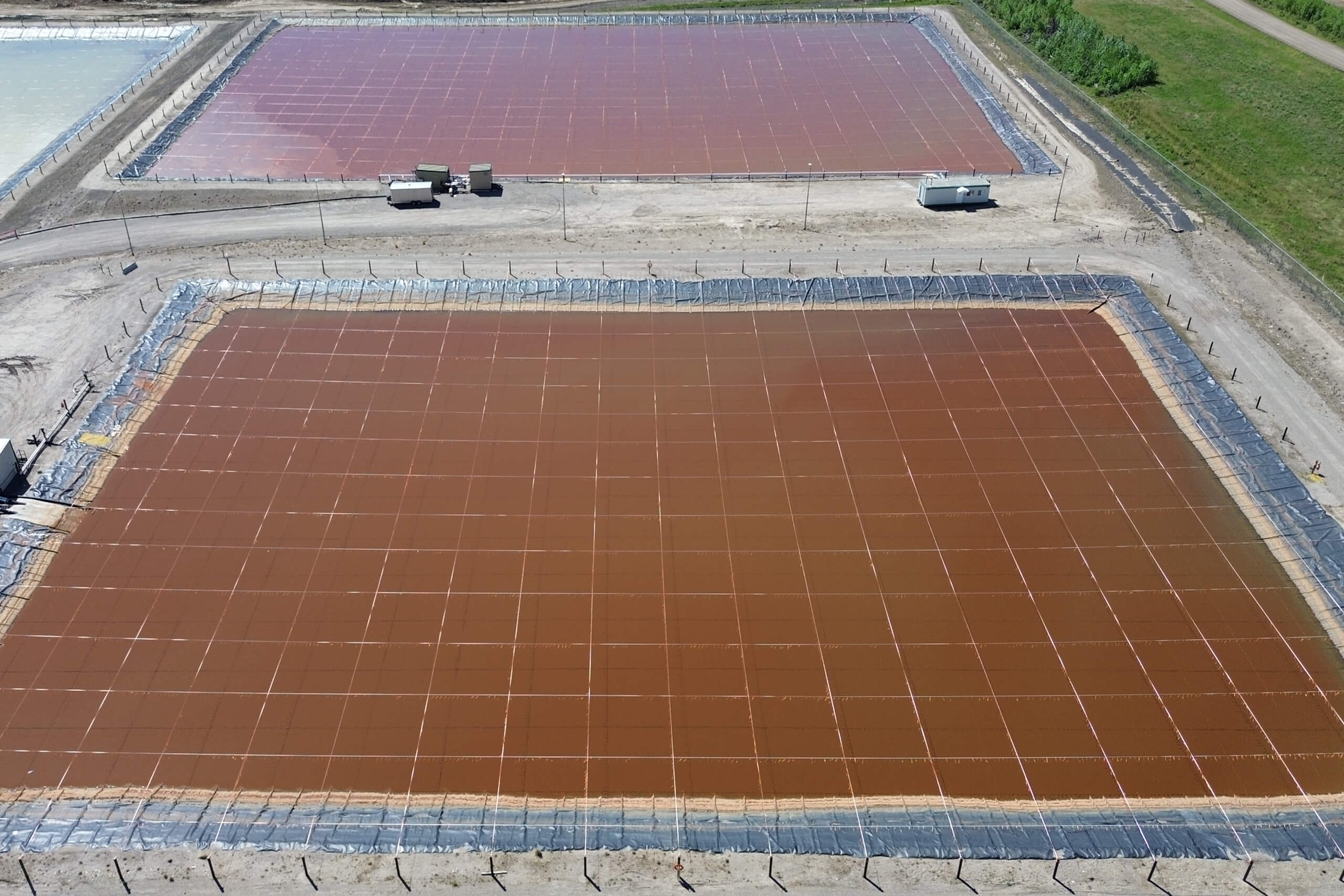 Rise Tape installed over 2 large industrial ponds.